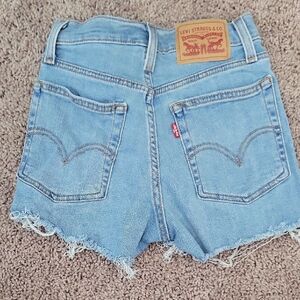 Levi's Light Blue Frayed Hem Jean Shorts Size 23